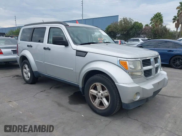 ✅ 2009 Dodge Nitro SE • VIN: 1D8GU28K49W510237 • Lot: 43697238. Listed on IAAI with 155,588 mi. Free auction sales archive from the USA and detailed vehicle history report at DreamBid. Image 1.