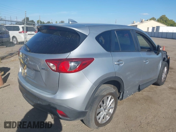 ✅ 2016 Mazda CX-5 Touring • VIN: JM3KE2CY9G0635615 • Lot: 43189227. Wystawiony na IAAI z przebiegiem 185 724 mil. Bezpłatny archiwum sprzedaży aukcyjnych z USA i szczegółowy raport historii pojazdu na DreamBid. Zdjęcie 4.