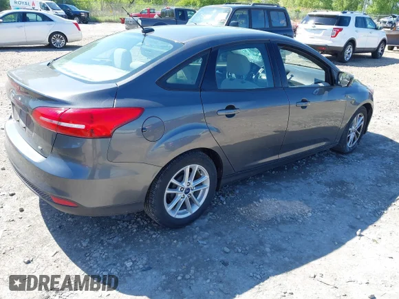 ✅ 2018 Ford Focus SE • VIN: 1FADP3F24JL252587 • Lot: 45231933. Wystawiony na IAAI z przebiegiem 123 910 mil. Bezpłatny archiwum sprzedaży aukcyjnych z USA i szczegółowy raport historii pojazdu na DreamBid. Zdjęcie 4.