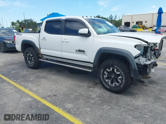 ✅ 2016 Toyota Tacoma TRD Sport • VIN: 3TMAZ5CN5GM016832 • Lot: 45374602. Listed on IAAI with 136,505 mi. Free auction sales archive from the USA and detailed vehicle history report at DreamBid. Image 1.