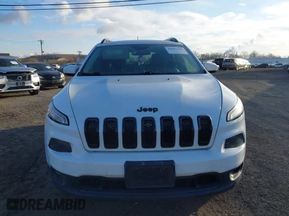 ✅ 2014 Jeep Cherokee Latitude • VIN: 1C4PJMCS2EW310767 • Lot: 44007949. Wystawiony na IAAI z przebiegiem 125 272 mil. Bezpłatny archiwum sprzedaży aukcyjnych z USA i szczegółowy raport historii pojazdu na DreamBid. Zdjęcie 6.