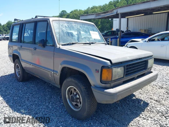 ✅ 1989 Isuzu Trooper • VIN: JACCH58R2K8922214 • Lot: 42847000. Wystawiony na IAAI z przebiegiem 256 271 mil. Bezpłatny archiwum sprzedaży aukcyjnych z USA i szczegółowy raport historii pojazdu na DreamBid. Zdjęcie 1.