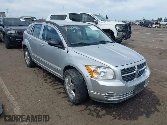 ✅ 2009 Dodge Caliber SXT • VIN: 1B3HB48A49D147611 • Lot: 41981640. Listed on IAAI with 190,510 mi. Free auction sales archive from the USA and detailed vehicle history report at DreamBid. Image 1.