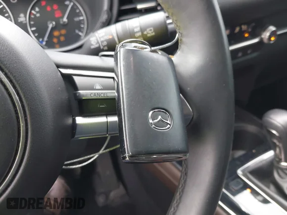 ✅ 2023 Mazda CX-30 Premium • VIN: 3MVDMBDY7PM579964 • Лот: 41272539. Опубліковано раніше на IAAI з пробігом 18 985 миль. Безкоштовний доступ до архіву аукціонних продажів зі США та докладний звіт про історію автомобіля на DreamBid. Зображення 11.