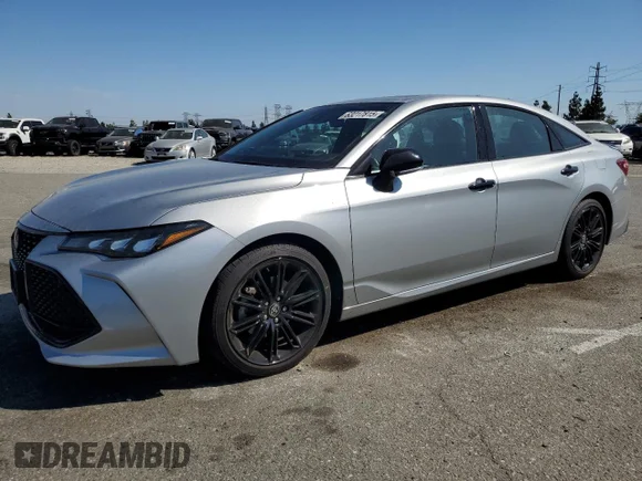 ✅ 2022 Toyota Avalon Hybrid XSE Nightshade • VIN: 4T1EA1AB6NU015736 • Лот: 63217815. Опубликован ранее на Copart с пробегом 40 244 миль. Бесплатный доступ к архиву аукционных продаж из США и подробный отчёт об истории автомобиля на DreamBid. Изображение 1.