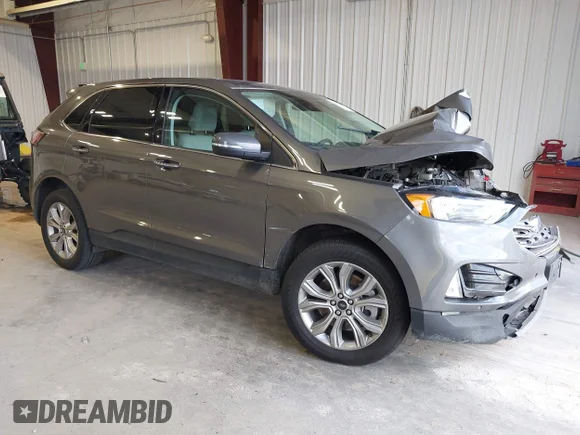 ✅ 2023 Ford Edge Titanium • VIN: 2FMPK4K97PBA44268 • Лот: 43522348. Опубліковано раніше на IAAI з пробігом 100 969 миль. Безкоштовний доступ до архіву аукціонних продажів зі США та докладний звіт про історію автомобіля на DreamBid. Зображення 1.