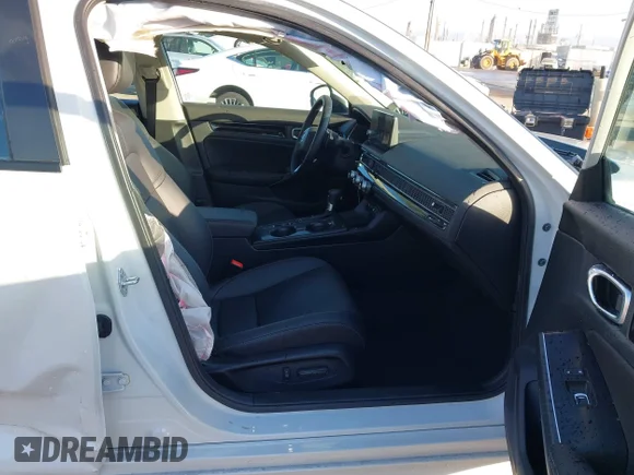 ✅ 2023 Honda Civic Touring • VIN: 2HGFE1F94PH309033 • Лот: 44285039. Опубліковано раніше на IAAI з пробігом 11 076 миль. Безкоштовний доступ до архіву аукціонних продажів зі США та докладний звіт про історію автомобіля на DreamBid. Зображення 5.