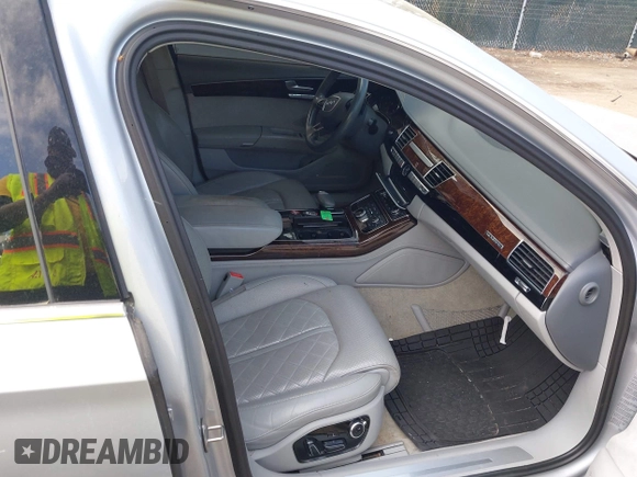 ✅ 2014 Audi A8 3.0T • VIN: WAURGAFD7EN004069 • Lot: 44746568. Wystawiony na IAAI z przebiegiem 166 570 mil. Bezpłatny archiwum sprzedaży aukcyjnych z USA i szczegółowy raport historii pojazdu na DreamBid. Zdjęcie 5.