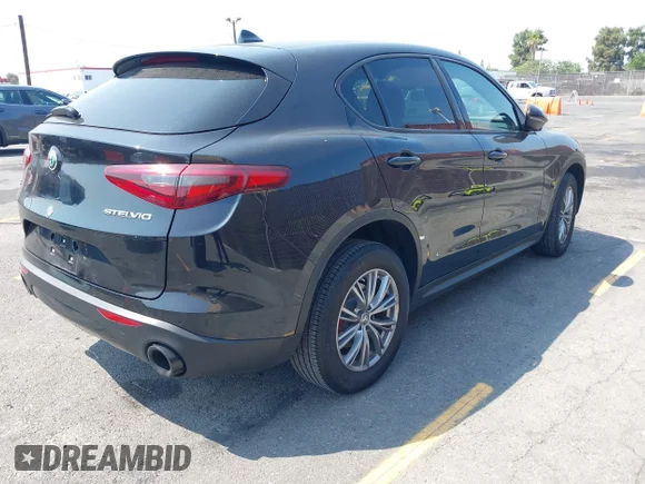 ✅ 2023 Alfa Romeo Stelvio Sprint • VIN: ZASPAKAN7P7D57380 • Lot: 42953148. Listed on IAAI with 27,242 mi. Free auction sales archive from the USA and detailed vehicle history report at DreamBid. Image 4.