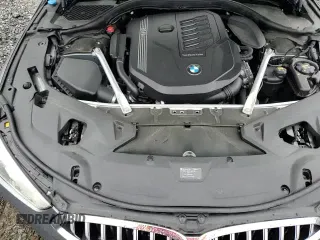 ✅ 2022 BMW 8 Series 840i • VIN: WBAGV4C05NCH54150 • Лот: 62773975. Опубликован ранее на Copart с пробегом 26 895 миль. Бесплатный доступ к архиву аукционных продаж из США и подробный отчёт об истории автомобиля на DreamBid. Изображение 13.