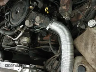 ✅ 1985 Jeep Grand Wagoneer • VIN: 1JCWC7567FT079177 • Lot: 43743736. Listed on IAAI with 132,950 mi. Free auction sales archive from the USA and detailed vehicle history report at DreamBid. Image 14.