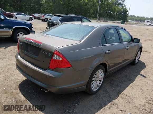 ✅ 2012 Ford Fusion Hybrid • VIN: 3FADP0L34CR403945 • Lot: 45645212. Wystawiony na IAAI z przebiegiem 89 594 mil. Bezpłatny archiwum sprzedaży aukcyjnych z USA i szczegółowy raport historii pojazdu na DreamBid. Zdjęcie 4.