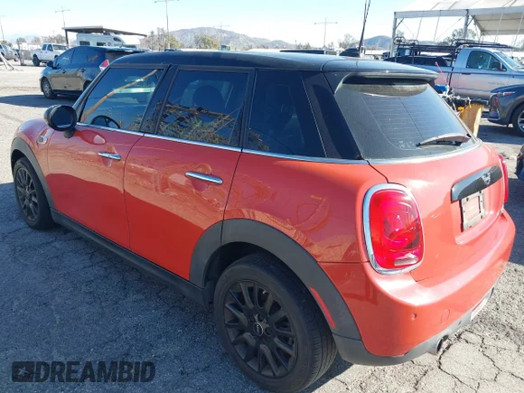 ✅ 2019 MINI Hardtop 4 Door Cooper • VIN: WMWXU1C5XK2H73520 • Lot: 41600830. Listed on IAAI with 38,099 mi. Free auction sales archive from the USA and detailed vehicle history report at DreamBid. Image 3.