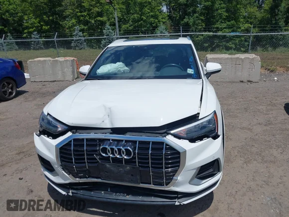✅ 2020 Audi Q3 Premium • VIN: WA1AECF39L1010852 • Lot: 39768583. Wystawiony na IAAI z przebiegiem 100 414 mil. Bezpłatny archiwum sprzedaży aukcyjnych z USA i szczegółowy raport historii pojazdu na DreamBid. Zdjęcie 6.