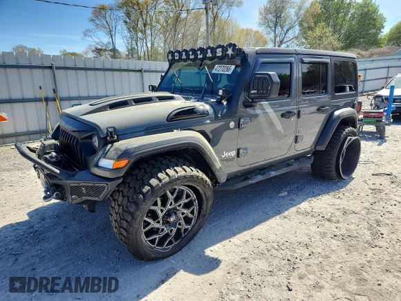 ✅ 2018 Jeep Wrangler Unlimited Sport • VIN: 1C4HJXDN6JW223267 • Лот: 47270266. Опубликован ранее на Copart с пробегом 117 881 миль. Бесплатный доступ к архиву аукционных продаж из США и подробный отчёт об истории автомобиля на DreamBid. Изображение 1.