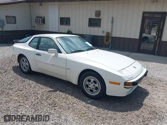 ✅ 1987 Porsche 944 • VIN: WP0AB0942HN476303 • Лот: 42909457. Опубликован ранее на IAAI с пробегом 90 145 миль. Бесплатный доступ к архиву аукционных продаж из США и подробный отчёт об истории автомобиля на DreamBid. Изображение 1.