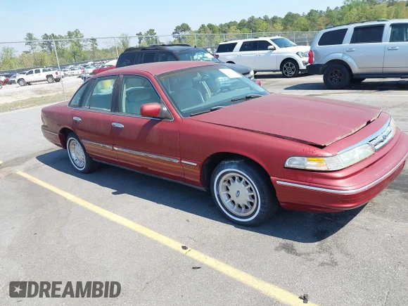 ✅ 1997 Ford Crown Victoria LX • VIN: 2FALP74W7VX233906 • Lot: 44718656. Listed on IAAI with 168,785 mi. Free auction sales archive from the USA and detailed vehicle history report at DreamBid. Image 1.