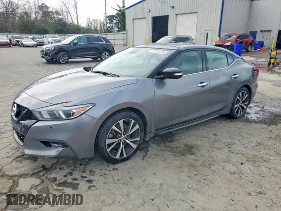 ✅ 2018 Nissan Maxima Platinum • VIN: 1N4AA6AP0JC369060 • Лот: 77701475. Опубликован ранее на Copart с пробегом 159 209 миль. Бесплатный доступ к архиву аукционных продаж из США и подробный отчёт об истории автомобиля на DreamBid. Изображение 1.