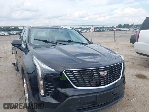 ✅ 2020 Cadillac XT4 FWD Luxury • VIN: 1GYAZAR4XLF065875 • Lot: 42972930. Listed on IAAI with 39,676 mi. Free auction sales archive from the USA and detailed vehicle history report at DreamBid. Image 1.