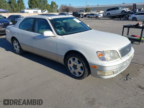 ✅ 1998 Lexus LS 400 • VIN: JT8BH28F1W0100718 • Лот: 44129745. Опубліковано раніше на IAAI з пробігом 183 171 миль. Безкоштовний доступ до архіву аукціонних продажів зі США та докладний звіт про історію автомобіля на DreamBid. Зображення 1.