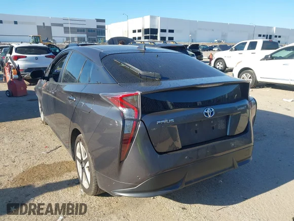 ✅ 2018 Toyota Prius Two • VIN: JTDKARFUXJ3546955 • Лот: 43128346. Опубликован ранее на IAAI с пробегом 85 182 миль. Бесплатный доступ к архиву аукционных продаж из США и подробный отчёт об истории автомобиля на DreamBid. Изображение 3.