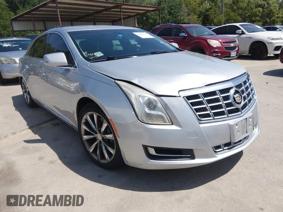 ✅ 2013 Cadillac XTS • VIN: 2G61N5S30D9215385 • Lot: 45476336. Wystawiony na IAAI z przebiegiem 154 808 mil. Bezpłatny archiwum sprzedaży aukcyjnych z USA i szczegółowy raport historii pojazdu na DreamBid. Zdjęcie 1.