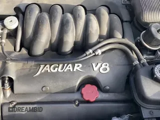 ✅ 1997 Jaguar XK • VIN: SAJGX2748VC006585 • Лот: 95865615. Опубликован ранее на Copart с пробегом 83 518 миль. Бесплатный доступ к архиву аукционных продаж из США и подробный отчёт об истории автомобиля на DreamBid. Изображение 11.