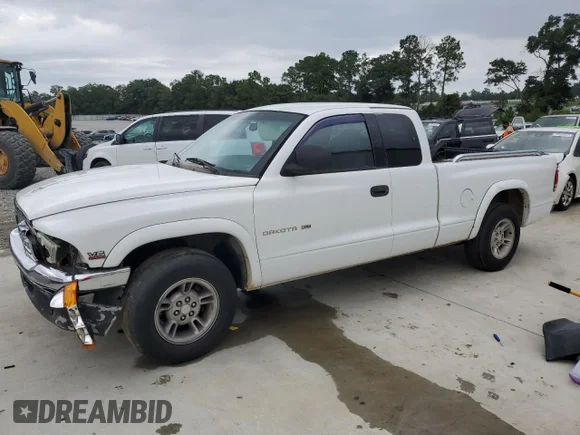 ✅ 1999 Dodge Dakota SLT • VIN: 1B7GL22X2XS106718 • Лот: 70169105. Опубліковано раніше на Copart з пробігом 291 180 миль. Безкоштовний доступ до архіву аукціонних продажів зі США та докладний звіт про історію автомобіля на DreamBid. Зображення 1.