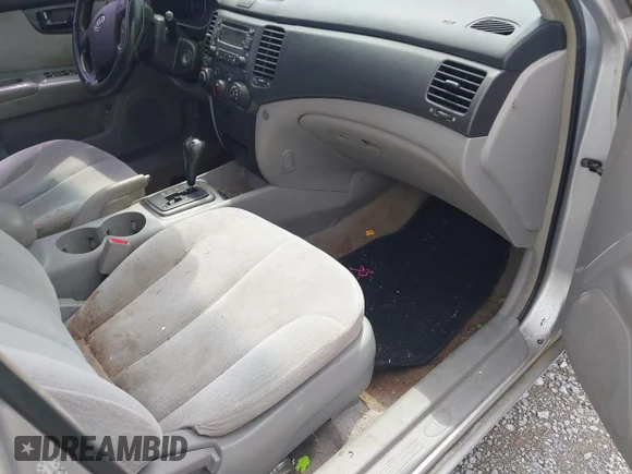 ✅ 2006 Kia Optima LX • VIN: KNAGE123X65039782 • Лот: 42294795. Опубліковано раніше на IAAI з пробігом Не вказано. Безкоштовний доступ до архіву аукціонних продажів зі США та докладний звіт про історію автомобіля на DreamBid. Зображення 5.