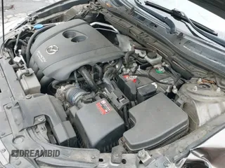 ✅ 2014 Mazda 3 S Grand Touring • VIN: JM1BM1M3XE1164610 • Lot: 42421946. Listed on IAAI with 96,591 mi. Free auction sales archive from the USA and detailed vehicle history report at DreamBid. Image 20.