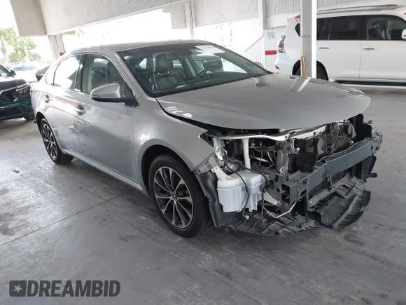 ✅ 2018 Toyota Avalon XLE • VIN: 4T1BK1EBXJU286948 • Lot: 45374026. Listed on IAAI with 141,594 mi. Free auction sales archive from the USA and detailed vehicle history report at DreamBid. Image 1.
