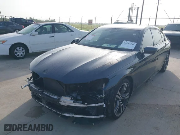 ✅ 2016 BMW 7 Series 750i xDrive • VIN: WBA7F2C56GG415192 • Lot: 42594343. Wystawiony na IAAI z przebiegiem 54 627 mil. Bezpłatny archiwum sprzedaży aukcyjnych z USA i szczegółowy raport historii pojazdu na DreamBid. Zdjęcie 6.