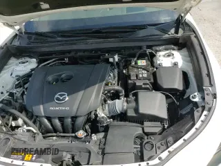 ✅ 2022 Mazda CX-30 S Premium • VIN: 3MVDMBDL6NM458473 • Лот: 66364035. Опубликован ранее на Copart с пробегом 64 305 миль. Бесплатный доступ к архиву аукционных продаж из США и подробный отчёт об истории автомобиля на DreamBid. Изображение 16.