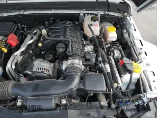 ✅ 2022 Jeep Wrangler Unlimited Sahara Altitude • VIN: 1C4HJXEG0NW240264 • Lot: 70543635. Listed on Copart with 16,757 mi. Free auction sales archive from the USA and detailed vehicle history report at DreamBid. Image 14.