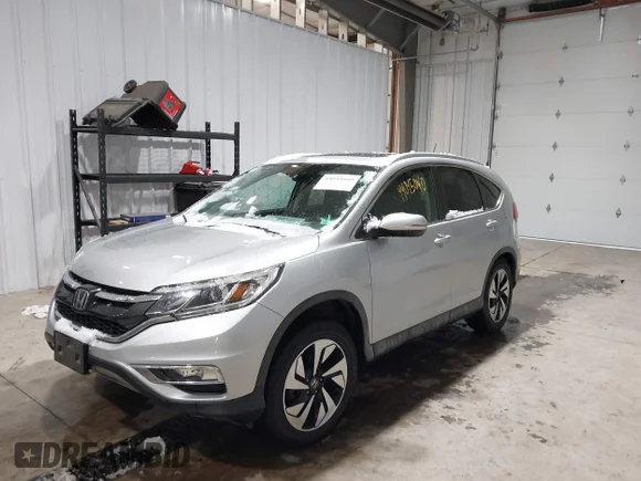 ✅ 2016 Honda CR-V Touring • VIN: 5J6RM4H97GL073116 • Lot: 44045040. Listed on IAAI with 114,640 mi. Free auction sales archive from the USA and detailed vehicle history report at DreamBid. Image 2.