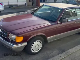 ✅ 1986 Mercedes-Benz 560 560SEC • VIN: WDBCA45D2GA206016 • Lot: 54577205. Wystawiony na Copart z przebiegiem 205 332 mil. Bezpłatny archiwum sprzedaży aukcyjnych z USA i szczegółowy raport historii pojazdu na DreamBid. Zdjęcie 11.