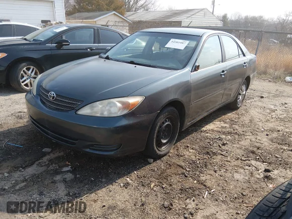 ✅ 2004 Toyota Camry LE • VIN: JTDBE32K540282927 • Lot: 44501087. Wystawiony na IAAI z przebiegiem 215 579 mil. Bezpłatny archiwum sprzedaży aukcyjnych z USA i szczegółowy raport historii pojazdu na DreamBid. Zdjęcie 2.