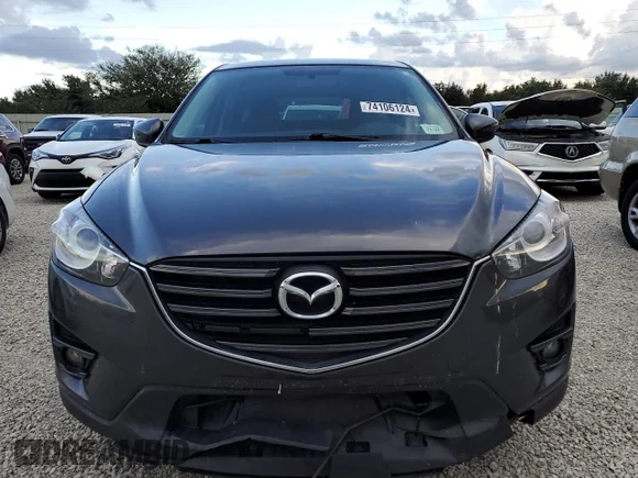 ✅ 2016 Mazda CX-5 Touring • VIN: JM3KE4CY3G0872869 • Lot: 74106124. Listed on Copart with Not provided. Free auction sales archive from the USA and detailed vehicle history report at DreamBid. Image 5.