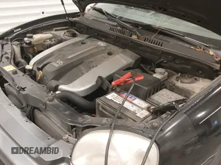 ✅ 2004 Hyundai Santa Fe GLS • VIN: KM8SC73E74U654567 • Lot: 43571152. Listed on IAAI with 167,999 mi. Free auction sales archive from the USA and detailed vehicle history report at DreamBid. Image 12.