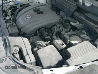 ✅ 2018 Mazda CX-5 Touring • VIN: JM3KFACM6J1409067 • Lot: 43716812. Listed on IAAI with 76,489 mi. Free auction sales archive from the USA and detailed vehicle history report at DreamBid. Image 19.