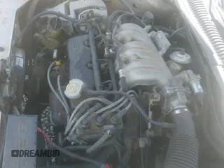 ✅ 1998 Ford Taurus LX • VIN: 1FAFP52UXWG250600 • Lot: 42486685. Wystawiony na IAAI z przebiegiem 200 563 mil. Bezpłatny archiwum sprzedaży aukcyjnych z USA i szczegółowy raport historii pojazdu na DreamBid. Zdjęcie 12.