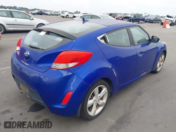 ✅ 2012 Hyundai Veloster w/Black Int • VIN: KMHTC6AD9CU027277 • Lot: 45318499. Wystawiony na IAAI z przebiegiem 158 007 mil. Bezpłatny archiwum sprzedaży aukcyjnych z USA i szczegółowy raport historii pojazdu na DreamBid. Zdjęcie 4.