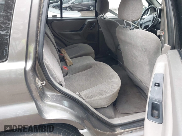 ✅ 2000 Jeep Grand Cherokee Laredo • VIN: 1J4GW48S6YC185038 • Lot: 44146891. Wystawiony na IAAI z przebiegiem 251 644 mil. Bezpłatny archiwum sprzedaży aukcyjnych z USA i szczegółowy raport historii pojazdu na DreamBid. Zdjęcie 8.