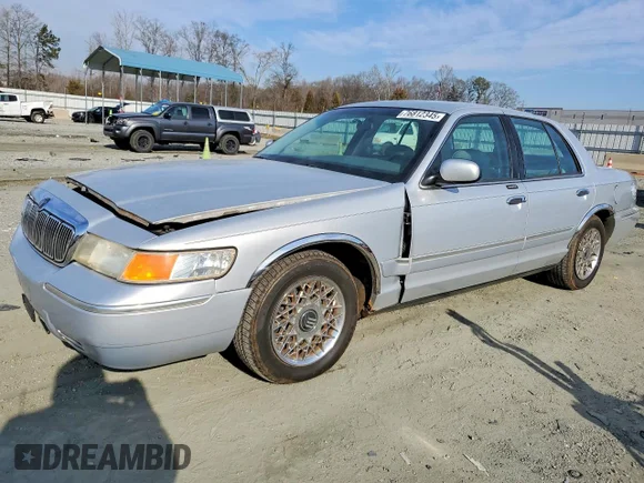 ✅ 2002 Mercury Grand Marquis GS • VIN: 2MEFM74W82X655905 • Lot: 76812345. Wystawiony na Copart z przebiegiem 106 662 mil. Bezpłatny archiwum sprzedaży aukcyjnych z USA i szczegółowy raport historii pojazdu na DreamBid. Zdjęcie 1.