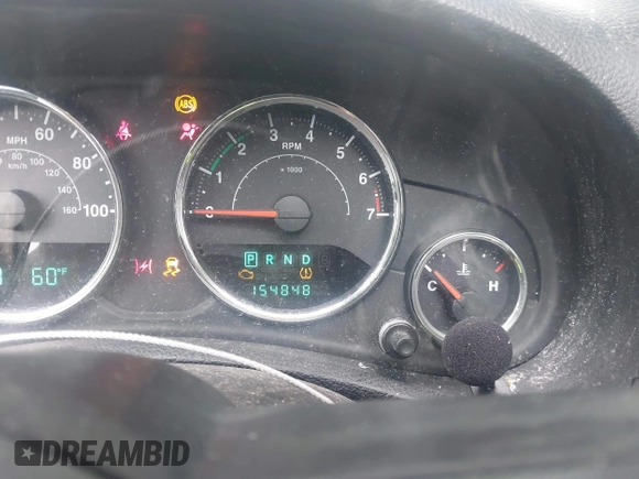 ✅ 2013 Jeep Wrangler Sport • VIN: 1C4AJWAG7DL672240 • Lot: 43998736. Wystawiony na IAAI z przebiegiem 154 848 mil. Bezpłatny archiwum sprzedaży aukcyjnych z USA i szczegółowy raport historii pojazdu na DreamBid. Zdjęcie 7.