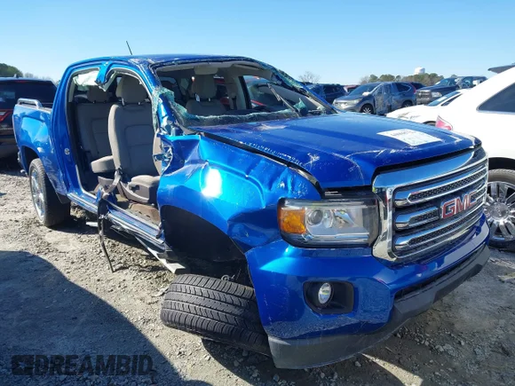 ✅ 2018 GMC Canyon 4WD SLE • VIN: 1GTG6CEN1J1115253 • Лот: 44008722. Опубліковано раніше на IAAI з пробігом 104 570 миль. Безкоштовний доступ до архіву аукціонних продажів зі США та докладний звіт про історію автомобіля на DreamBid. Зображення 1.
