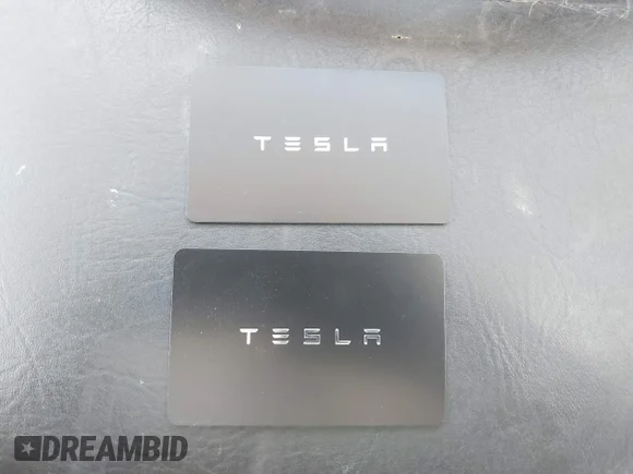 ✅ 2023 Tesla Model 3 Long Range • VIN: 5YJ3E1EB1PF595774 • Lot: 45100344. Listed on IAAI with 57,092 mi. Free auction sales archive from the USA and detailed vehicle history report at DreamBid. Image 11.