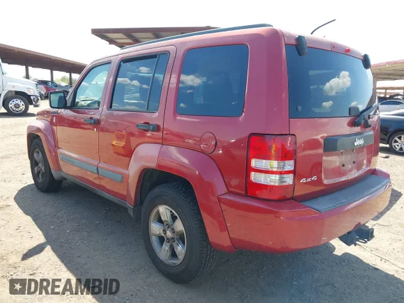 ✅ 2009 Jeep Liberty Sport • VIN: 1J8GN28K99W509668 • Lot: 42424740. Listed on IAAI with 140,923 mi. Free auction sales archive from the USA and detailed vehicle history report at DreamBid. Image 3.