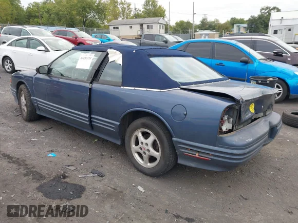 ✅ 1997 Oldsmobile Cutlass Supreme S • VIN: 1G3WH12M2VF320899 • Lot: 43187333. Wystawiony na IAAI z przebiegiem 166 639 mil. Bezpłatny archiwum sprzedaży aukcyjnych z USA i szczegółowy raport historii pojazdu na DreamBid. Zdjęcie 3.