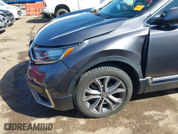 ✅ 2021 Honda CR-V Touring • VIN: 2HKRW2H9XMH600425 • Lot: 44594055. Wystawiony na IAAI z przebiegiem 74 808 mil. Bezpłatny archiwum sprzedaży aukcyjnych z USA i szczegółowy raport historii pojazdu na DreamBid. Zdjęcie 6.